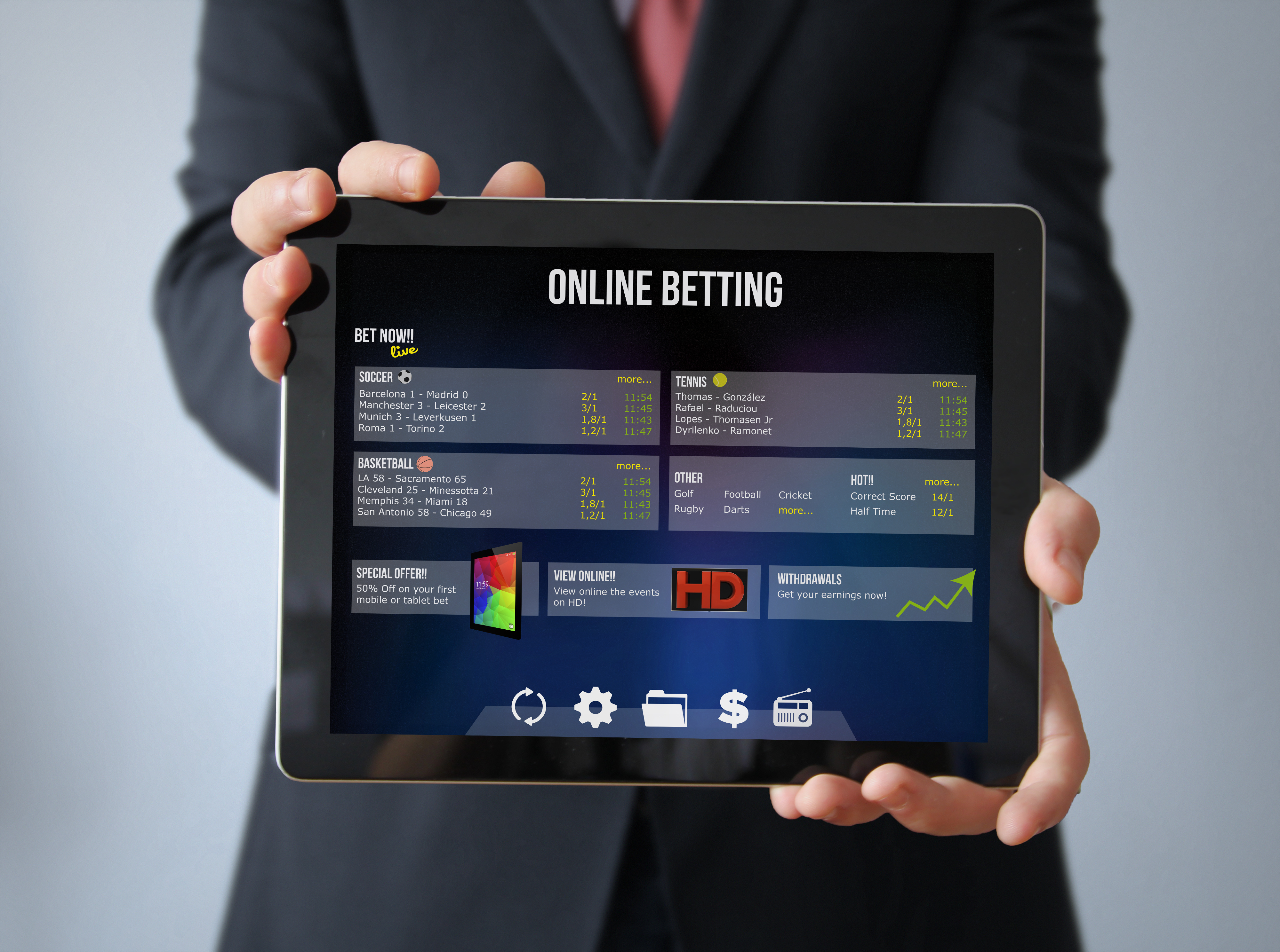 businessman with bet online tablet